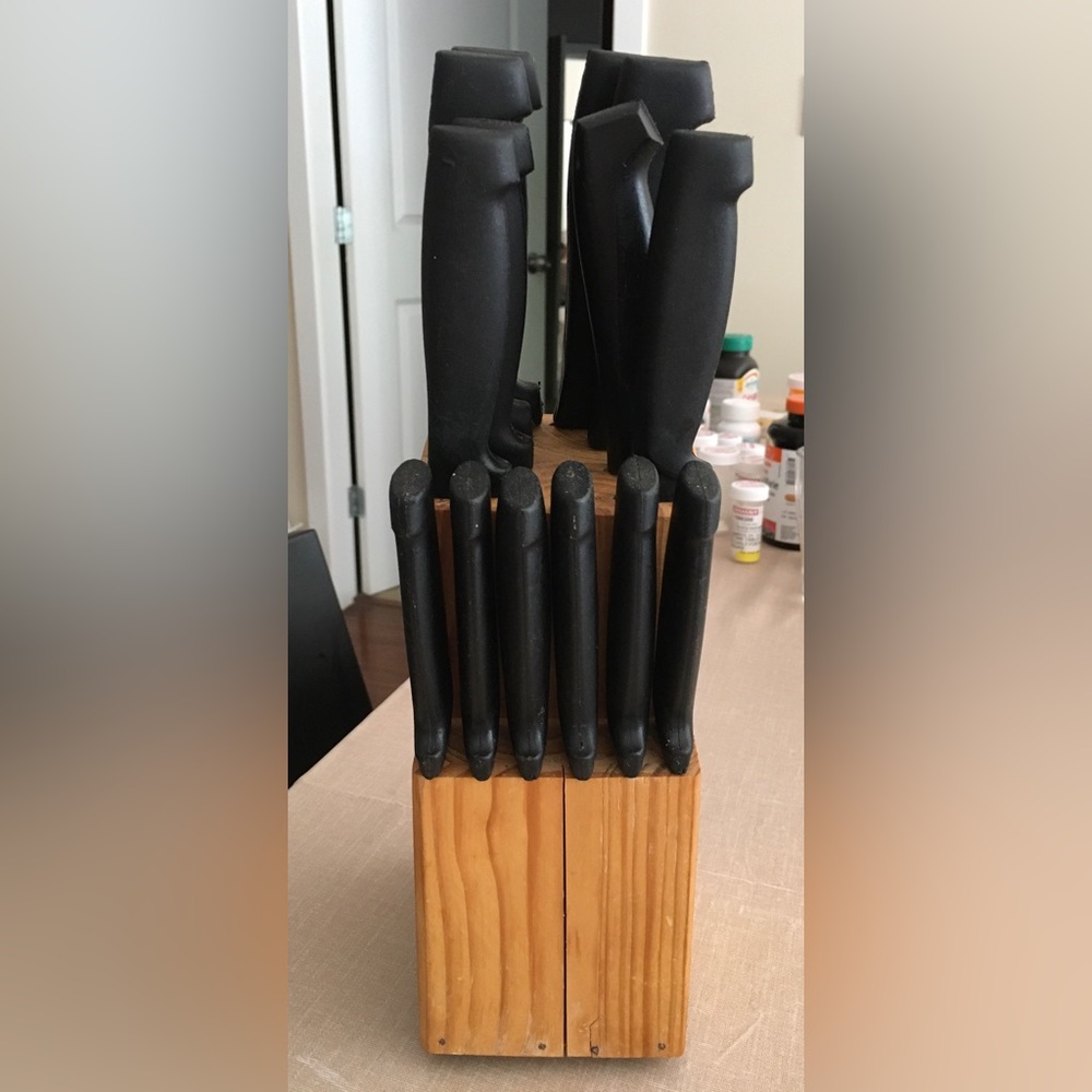 A set of 14 stainless steel knives